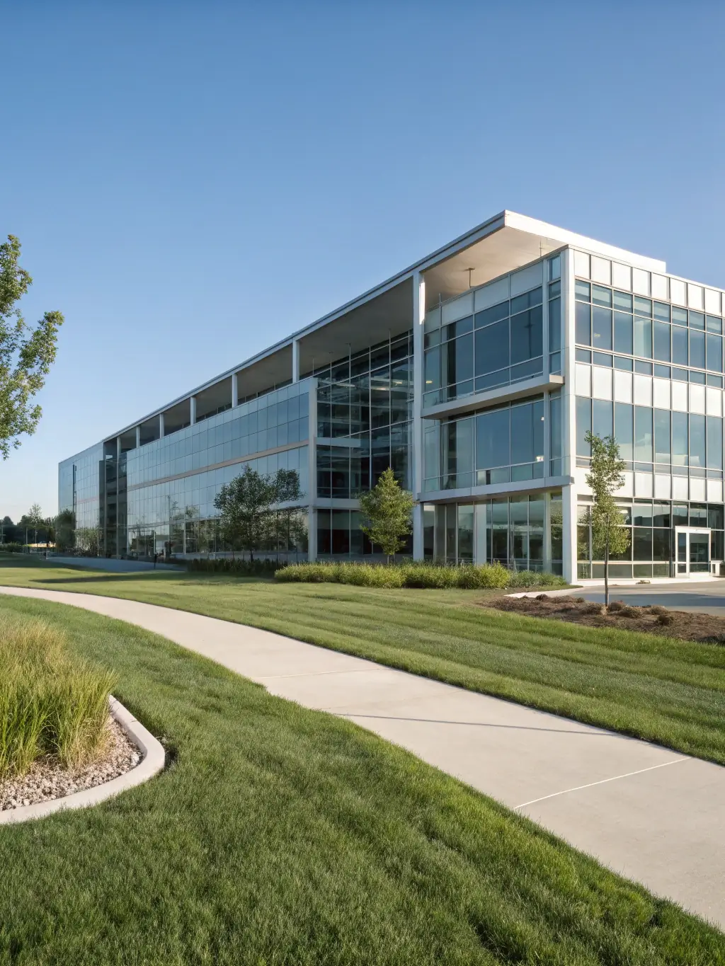 A modern office building representing real estate investments, highlighting the potential for stable and consistent returns.